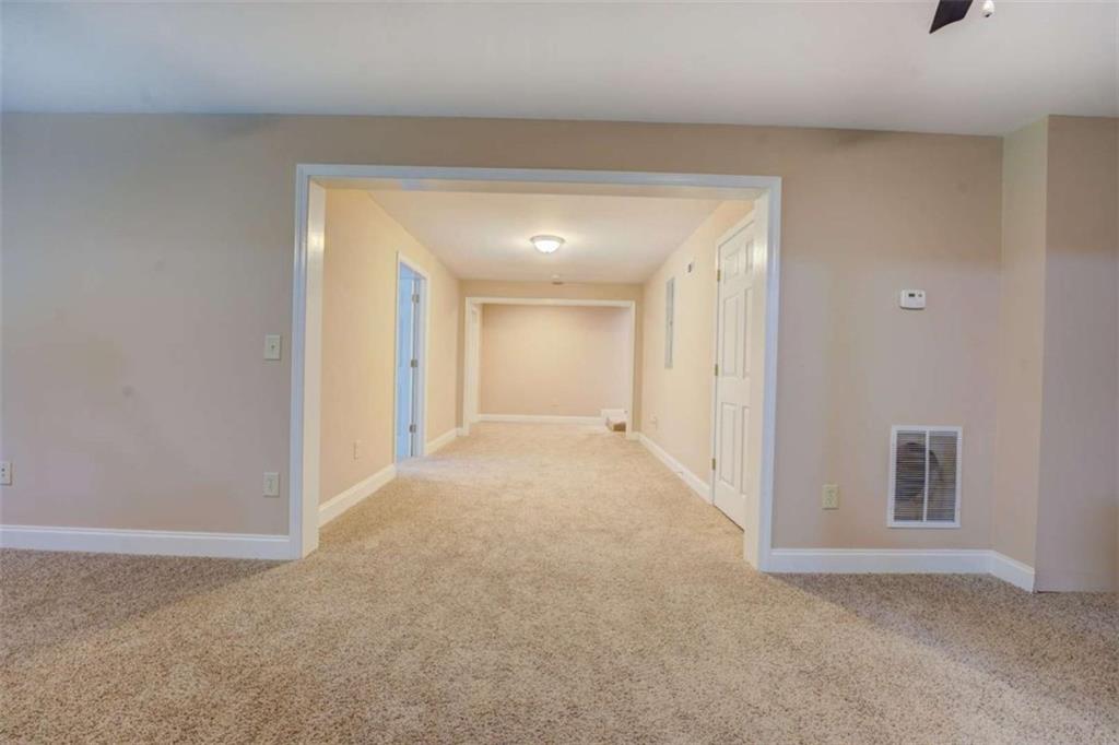 1041 Flat Rock Road Covington, GA 30014 - Photo 37 of 59 a view of an empty room and a window