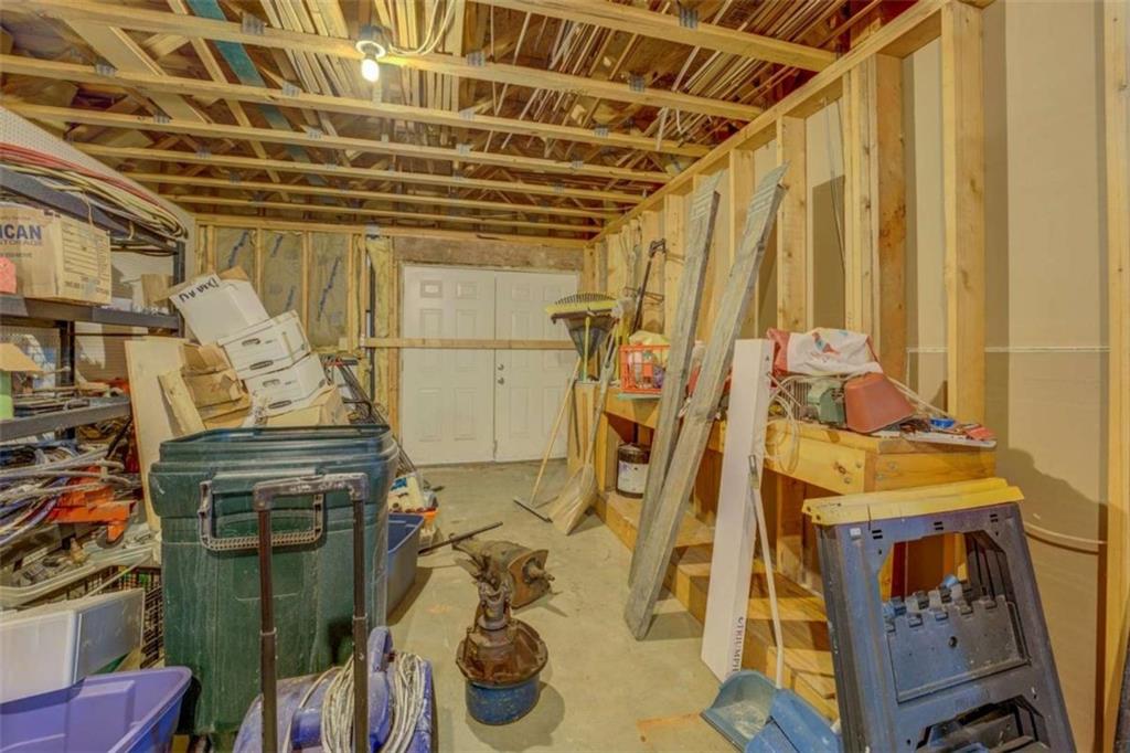 1041 Flat Rock Road Covington, GA 30014 - Photo 41 of 59 a utility room with dryer and washer