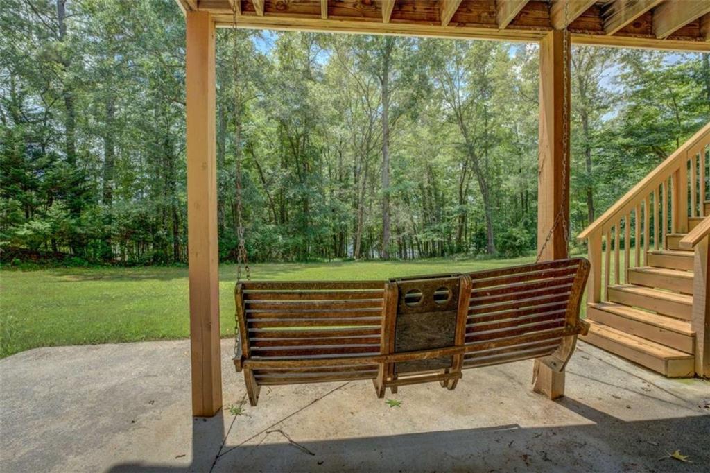 1041 Flat Rock Road Covington, GA 30014 - Photo 51 of 59 a view of a two chairs in the garden