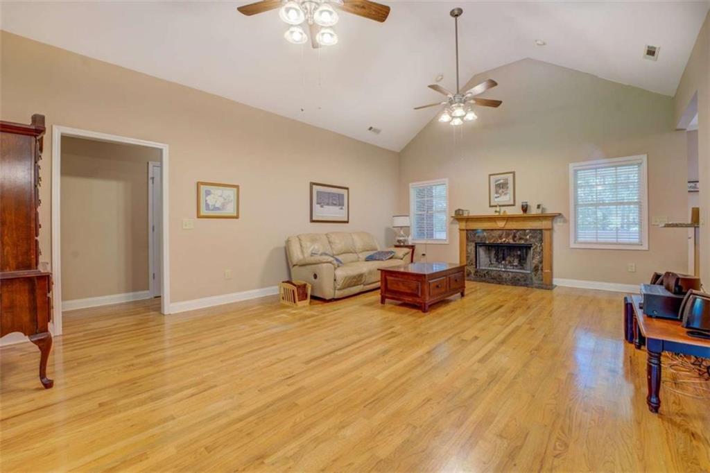 1041 Flat Rock Road Covington, GA 30014 - Photo 6 of 59 a living room with furniture and a fireplace