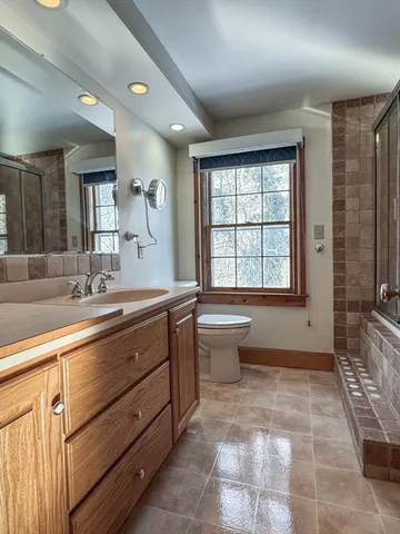 a bathroom with a shower and a bathtub