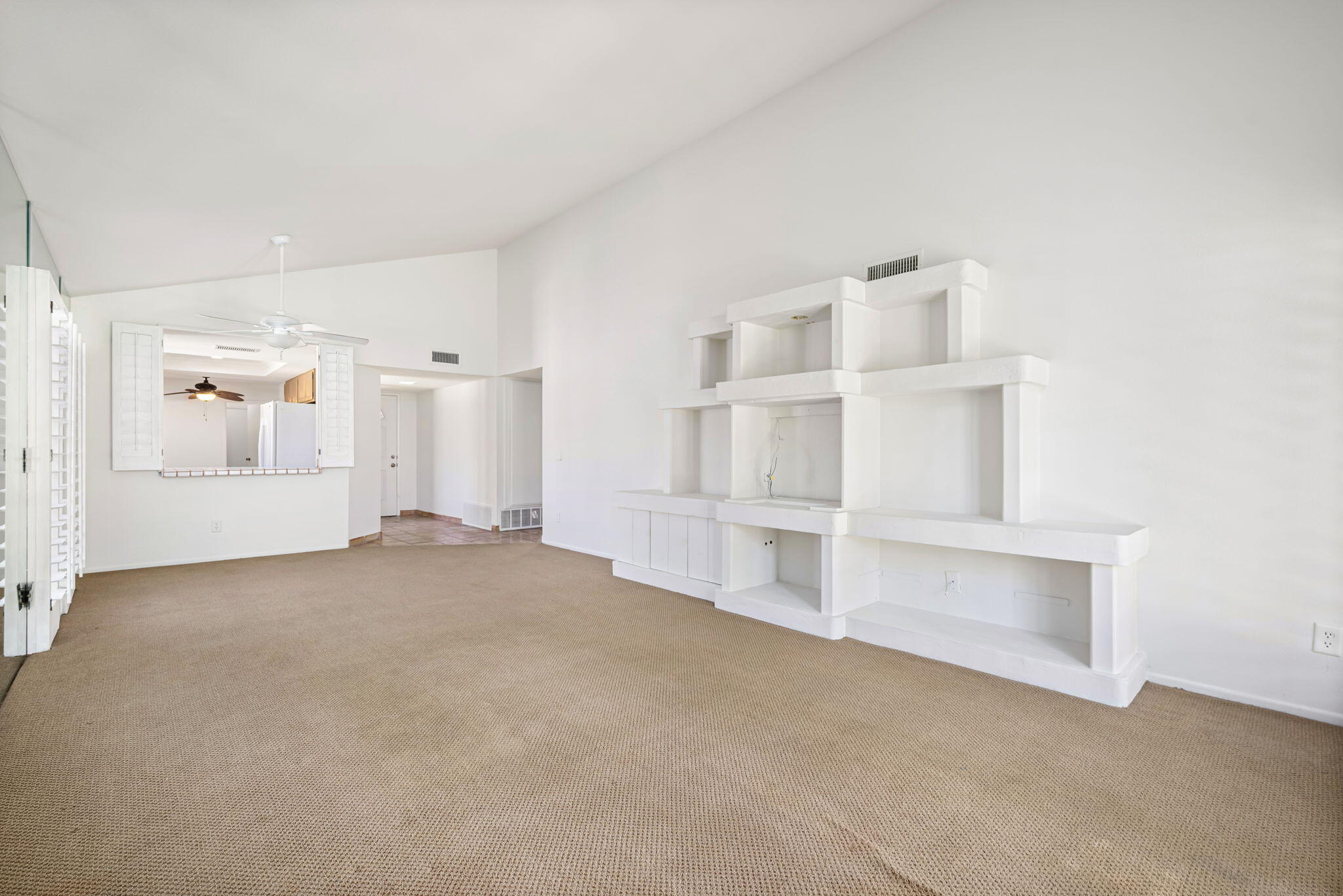 72499 Sandstone Lane Palm Desert, CA 92260 - Photo 40 of 53 a view of an empty room with white walls
