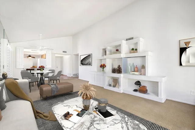 a view of an empty room with white walls