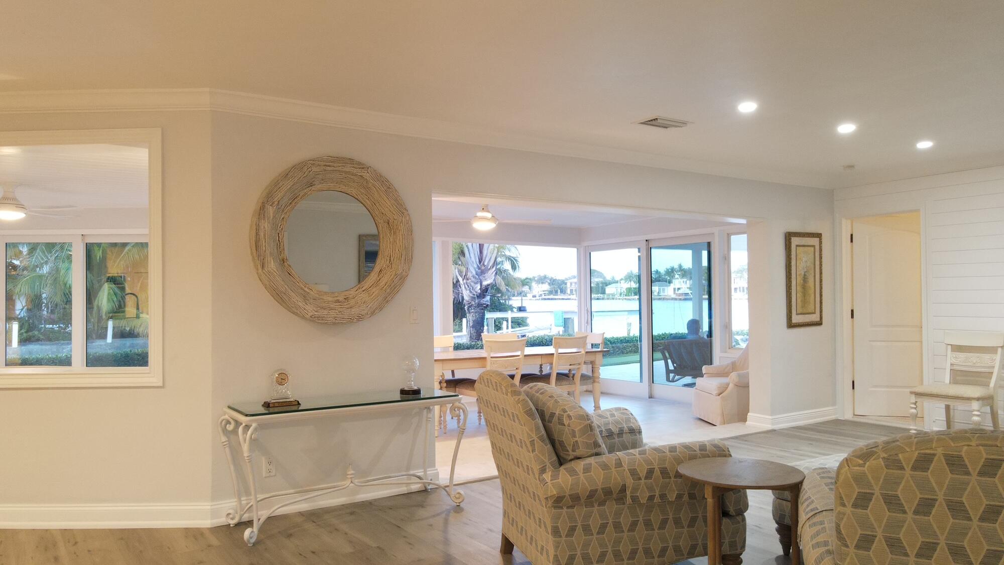 1459 Point Way North Palm Beach, FL 33408 - Photo 17 of 21 a living room with furniture and a large window