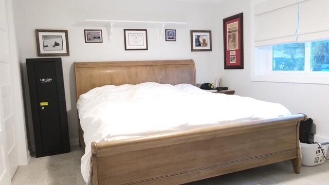 1459 Point Way North Palm Beach, FL 33408 - Photo 4 of 21 a bedroom with a bed and a window