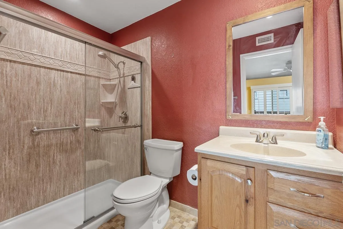 142 North Mine Canyon Road, Unit A Orange, CA 92869 - Photo 17 of 18 a bathroom with a sink toilet and shower