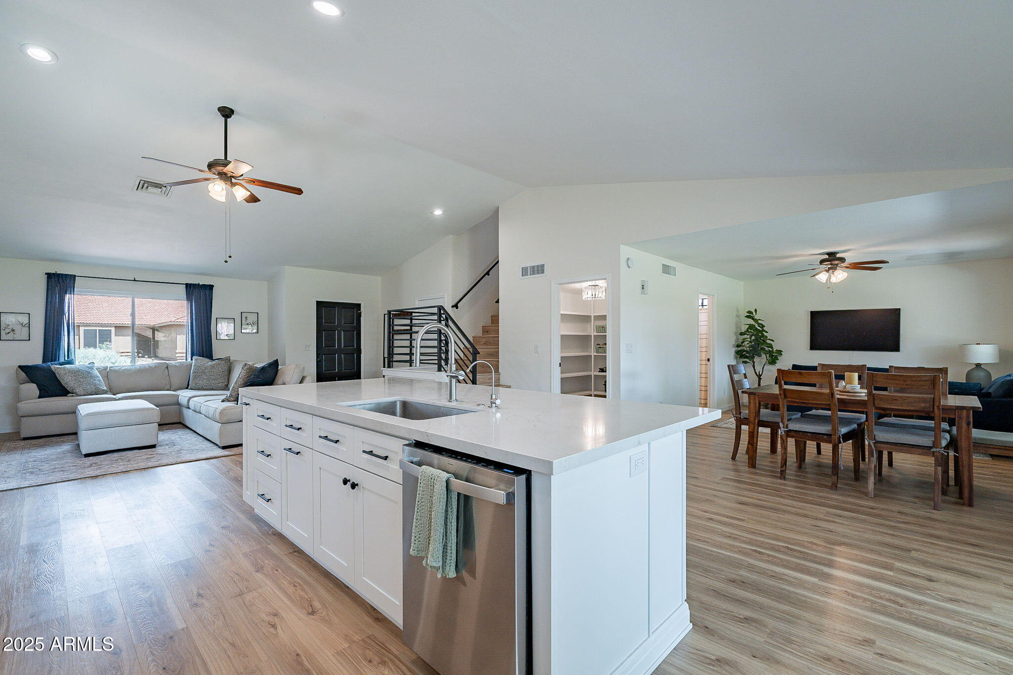 15026 South 28th Street Phoenix, AZ 85048 - Photo 12 of 40 a view of a dining room with furniture window and wooden floor