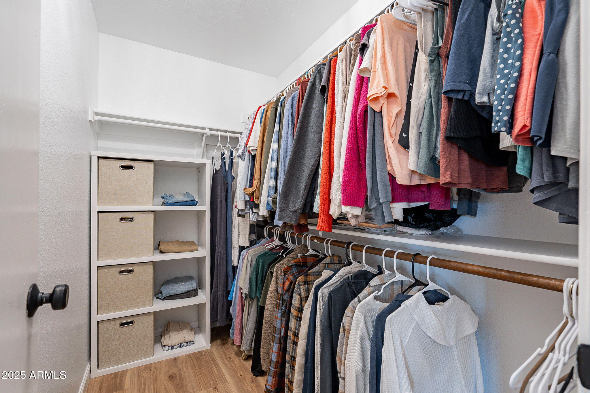 15026 South 28th Street Phoenix, AZ 85048 - Photo 20 of 40 a view of walk in closet with clothes and shoes