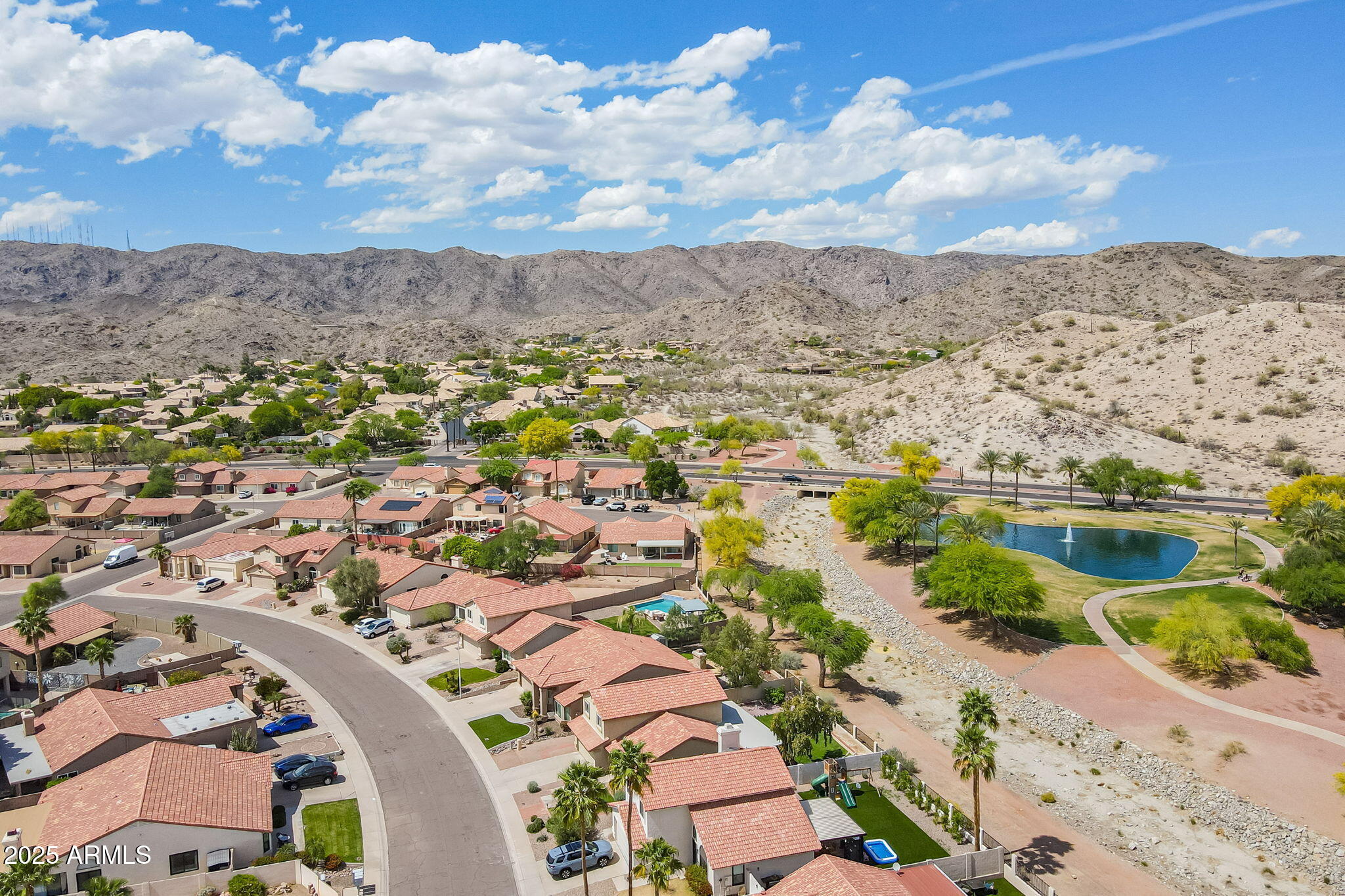 15026 South 28th Street Phoenix, AZ 85048 - Photo 35 of 40 an aerial view of lake and residential houses with outdoor space
