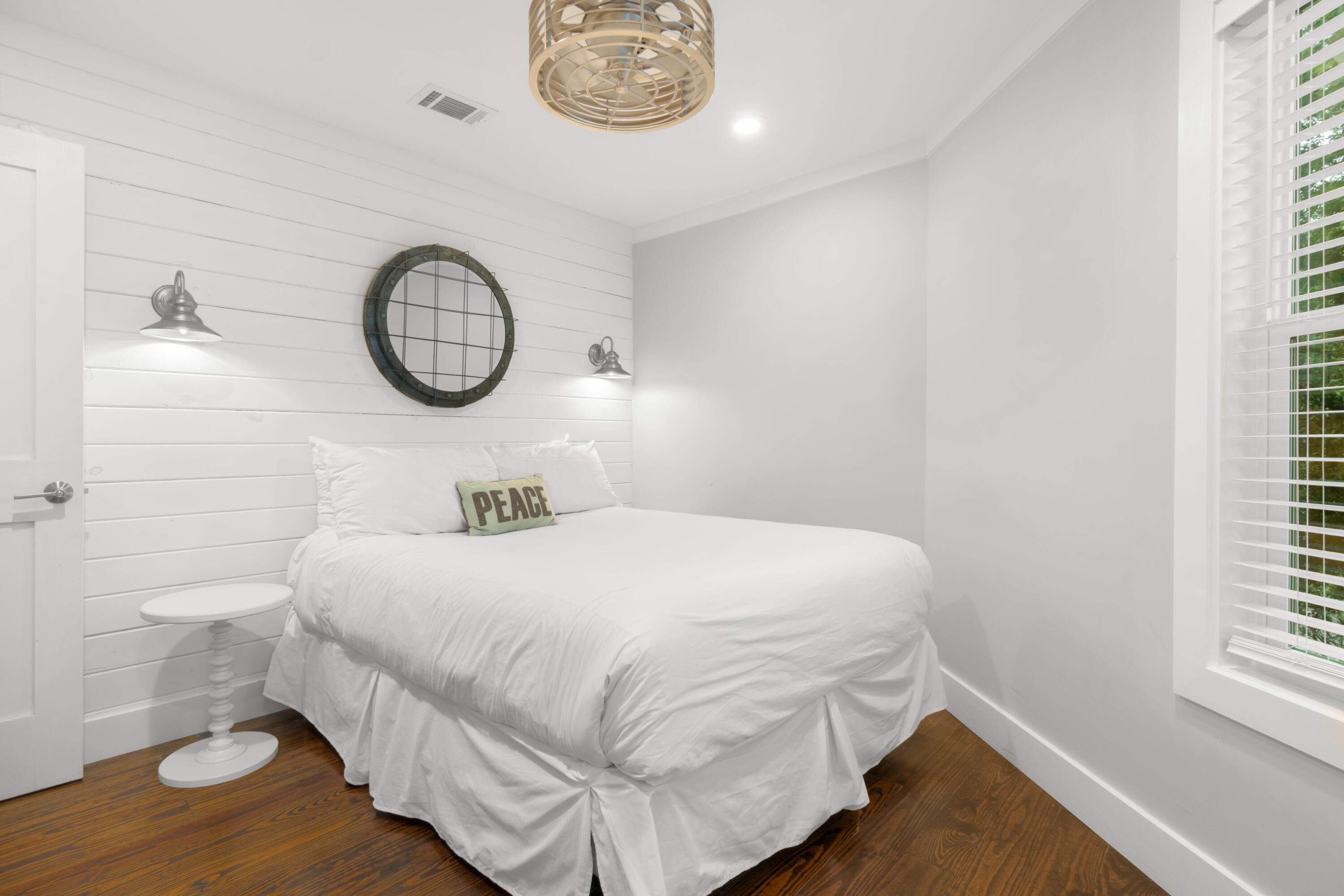 127 Dogwood Street Santa Rosa Beach, FL 32459 - Photo 18 of 24 a bedroom with a bed and a window