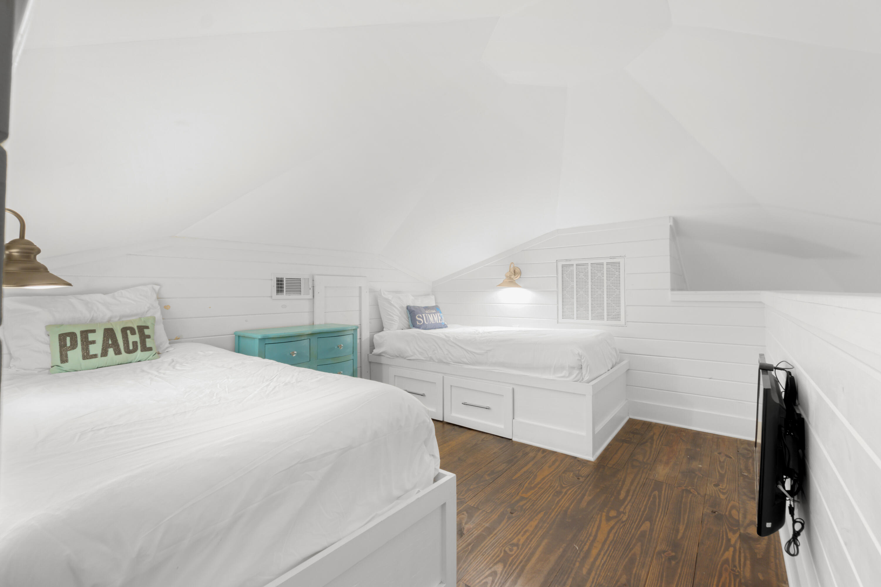 127 Dogwood Street Santa Rosa Beach, FL 32459 - Photo 21 of 24 a spacious bedroom with two beds and a desk