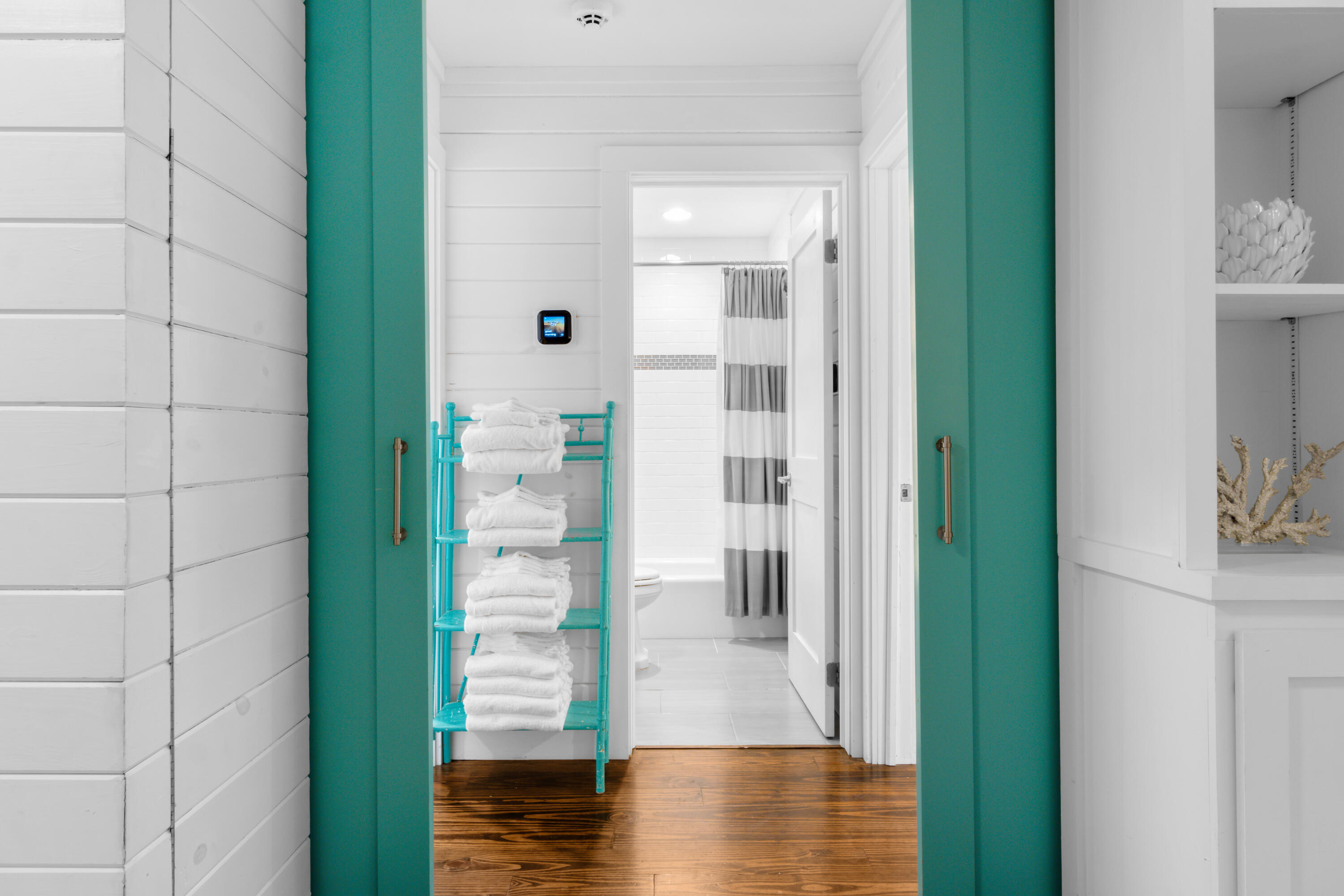 127 Dogwood Street Santa Rosa Beach, FL 32459 - Photo 3 of 22 a view of a bathroom from the hallway