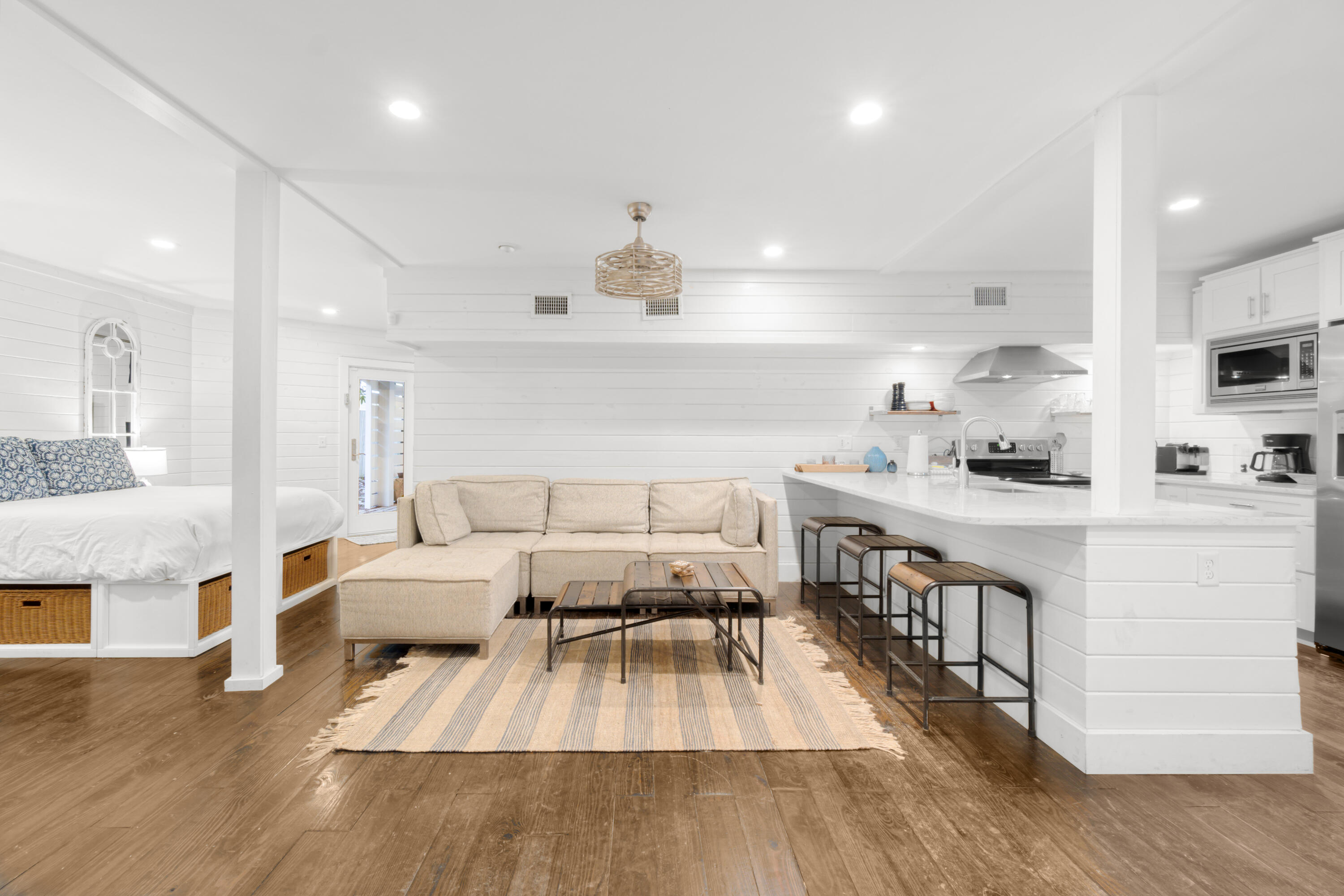 127 Dogwood Street Santa Rosa Beach, FL 32459 - Photo 10 of 24 a kitchen with counter top space a sink appliances and cabinets