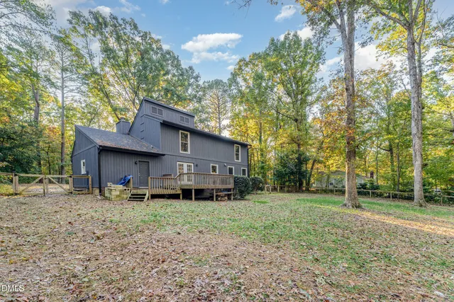 a house view with a backyard space