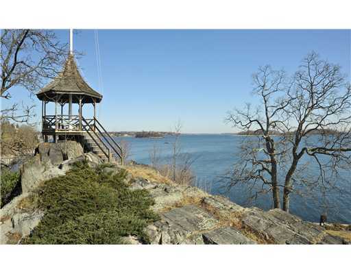 183 Byram Shore Road Greenwich, CT 06830 - Photo 19 of 20 a black and white photo of a lake