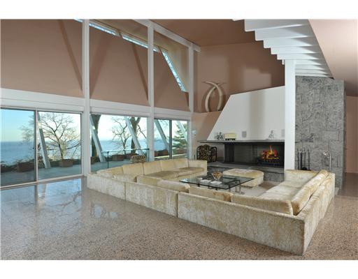 183 Byram Shore Road Greenwich, CT 06830 - Photo 3 of 20 a living room with furniture and a fireplace