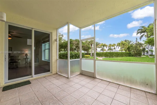 a view of a room with window and an outdoor view