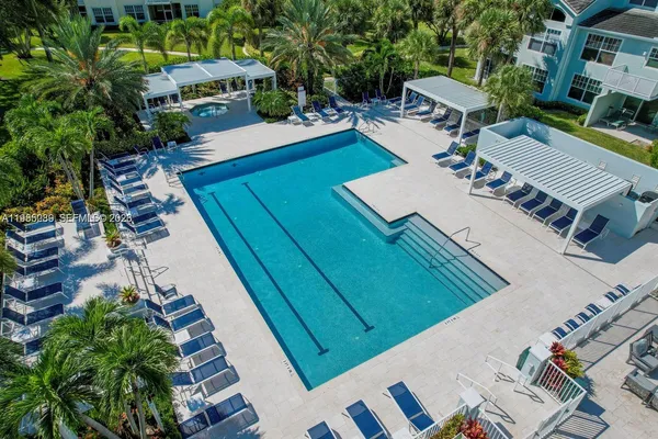 an aerial view of a house with outdoor space