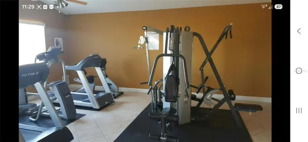 a view of a room with gym equipment
