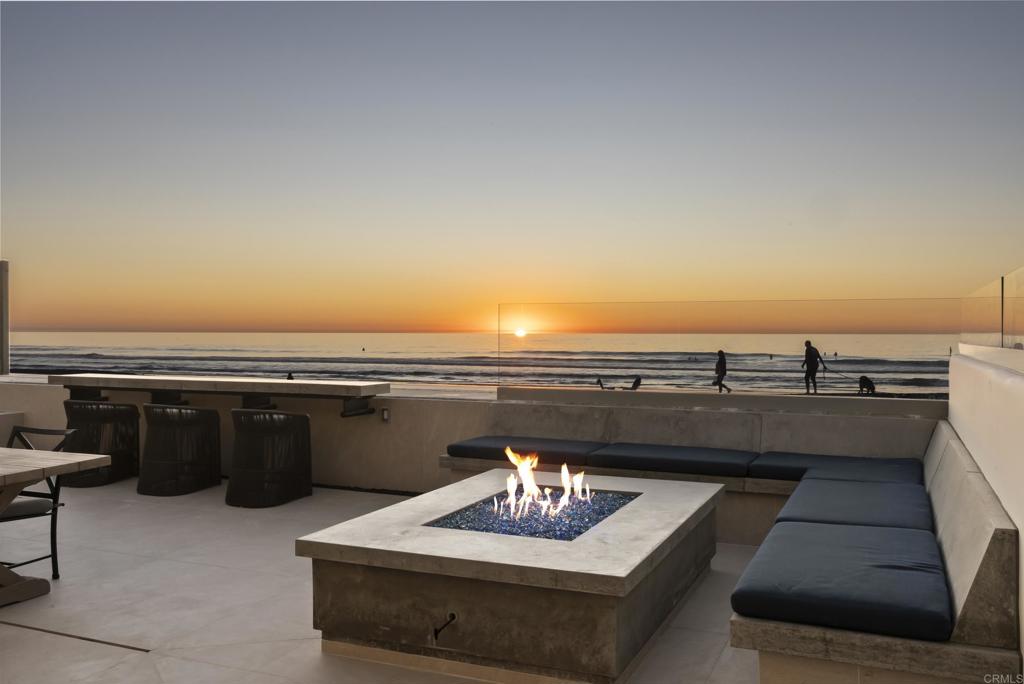 2016 Ocean Front Del Mar, CA 92014 - Photo 8 of 12 a view of a terrace with chairs