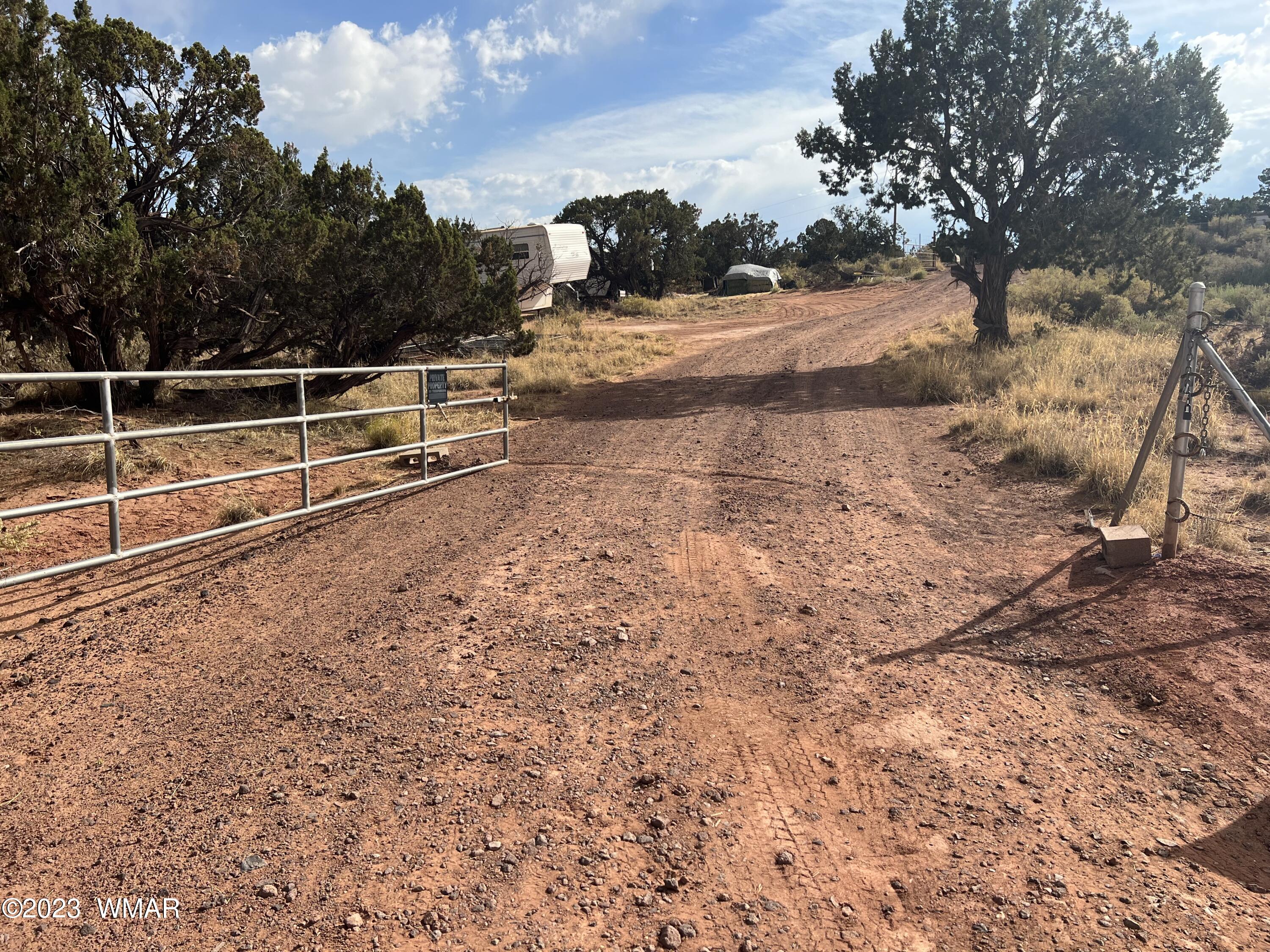 4412 Dusty Road Snowflake, AZ 85937 - Photo 15 of 19 a view of a yard with wooden fence