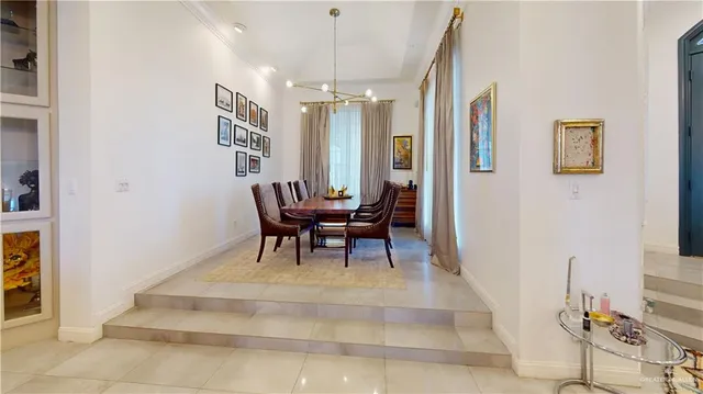 a view of hall way with furniture and staircase