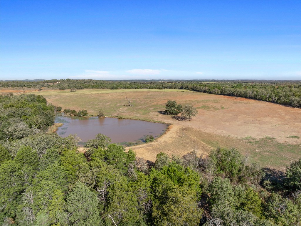 Tbd Stockade Ranch Road Paige, TX 78659 - Photo 4 of 37 an aerial view of ocean with residential house and outdoor space