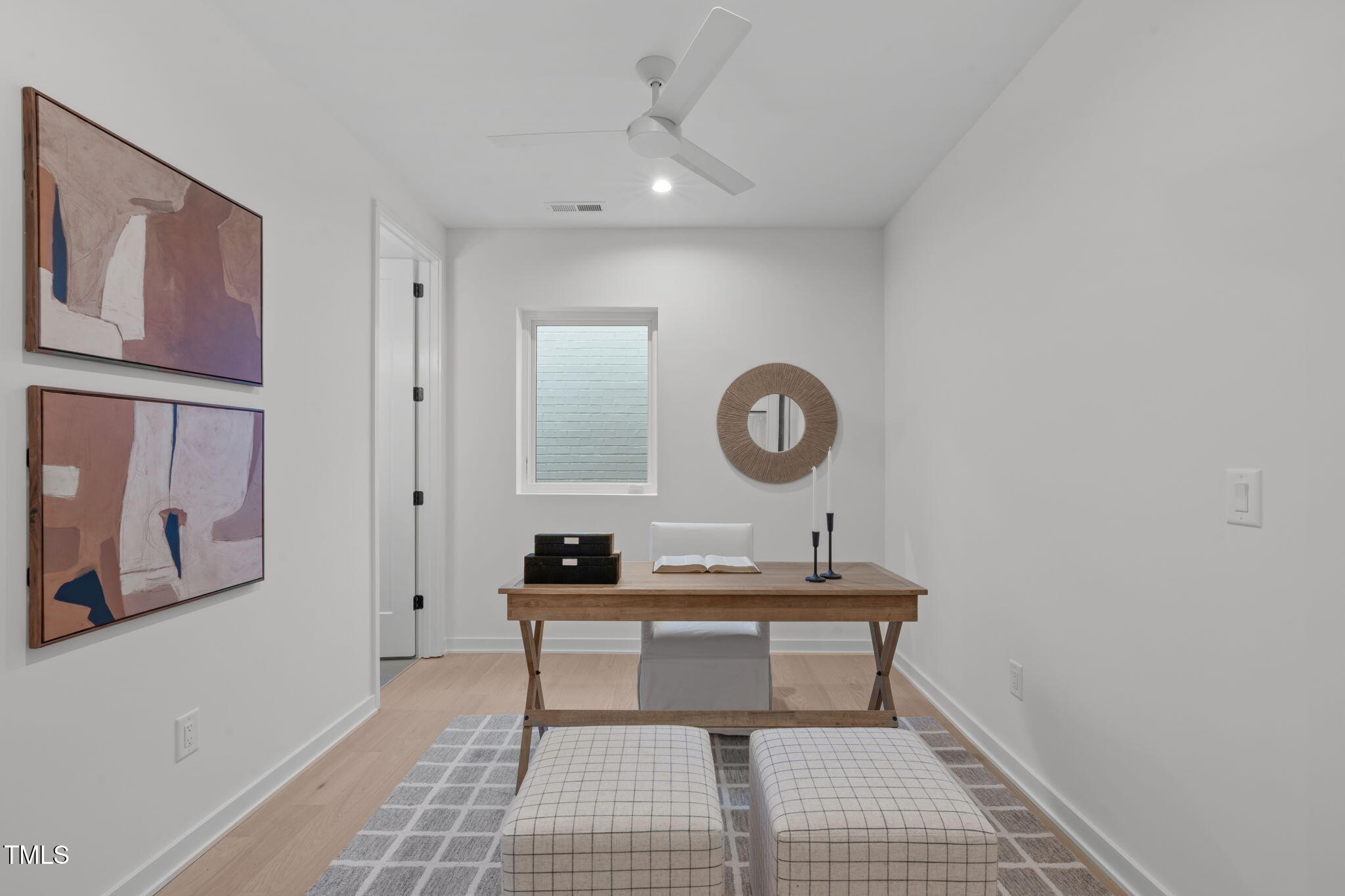 1301 Chamblee Hill Raleigh, NC 27608 - Photo 36 of 46 a room with a table and a mirror