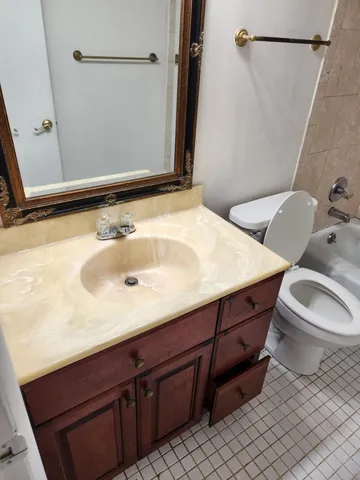 a bathroom with a sink and a toilet