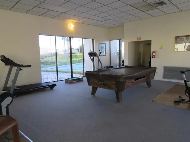 a view of swimming pool with seating