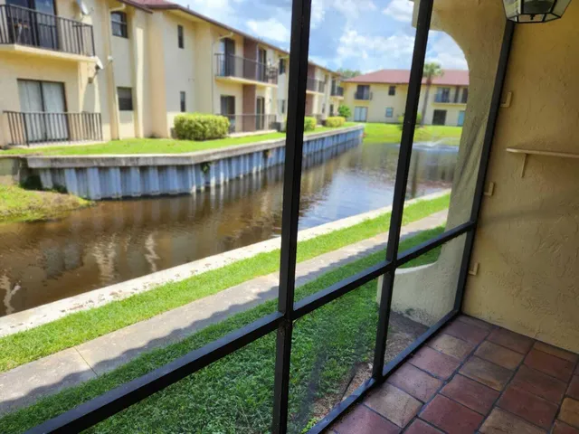 a view of swimming pool from a window