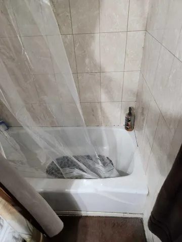 a view of a small yard from a balcony