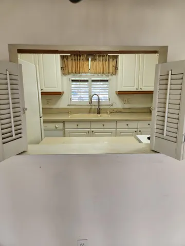 a view of kitchen and utility room