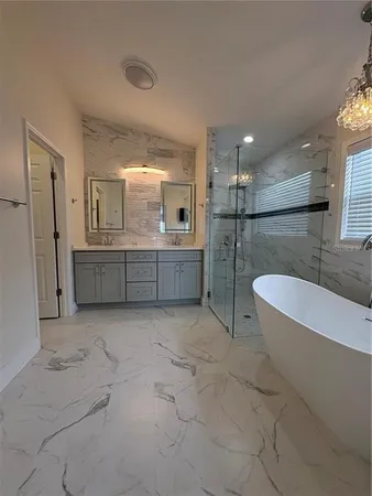 a view of a kitchen with a sink and cabinet area
