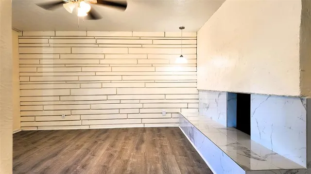 a kitchen with a refrigerator and a sink