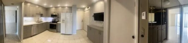 a bathroom with a glass door shower