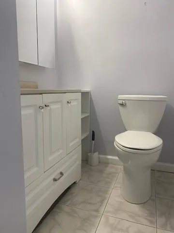 a bathroom with a toilet