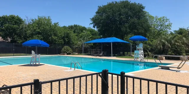 a view of a park with swings