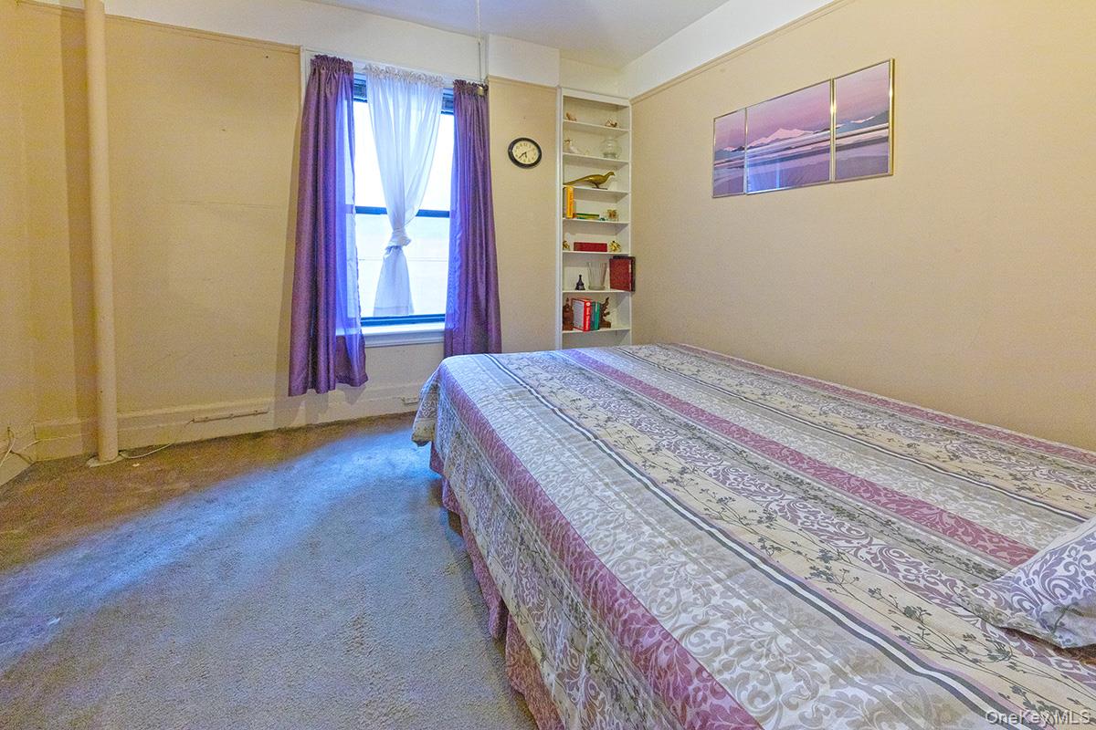 137 West 142nd Street, Unit 2D 2D Manhattan, NY 10030 - Photo 8 of 8 a bedroom with a bed and a window