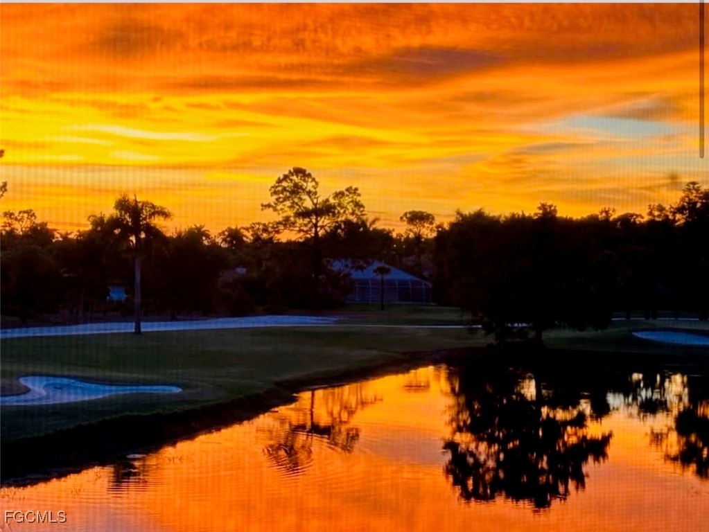 413 Augusta Boulevard, Unit 302 Naples, FL 34113 - Photo 22 of 22 a view of swimming pool and mountain