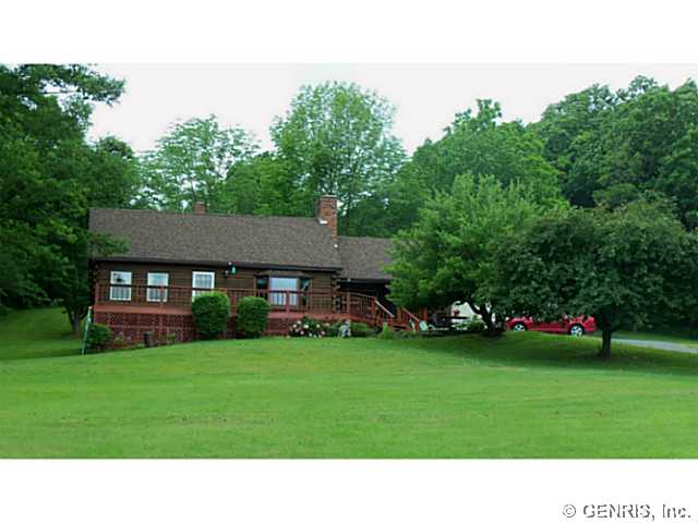 5540 Clark Road Conesus, NY 14435 - Photo 1 of 1 Exterior Front. Beautiful log home with 2 car gara