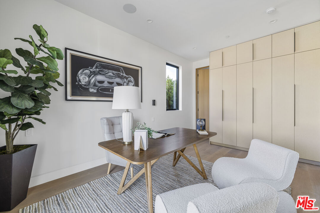 4220 Kenyon Avenue Los Angeles, CA 90066 - Photo 14 of 43 a view of a livingroom with furniture and a potted plant