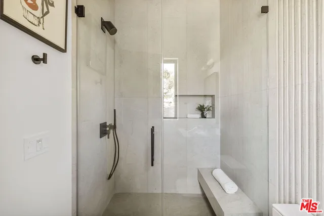 a close view of a sink and a washer dryer
