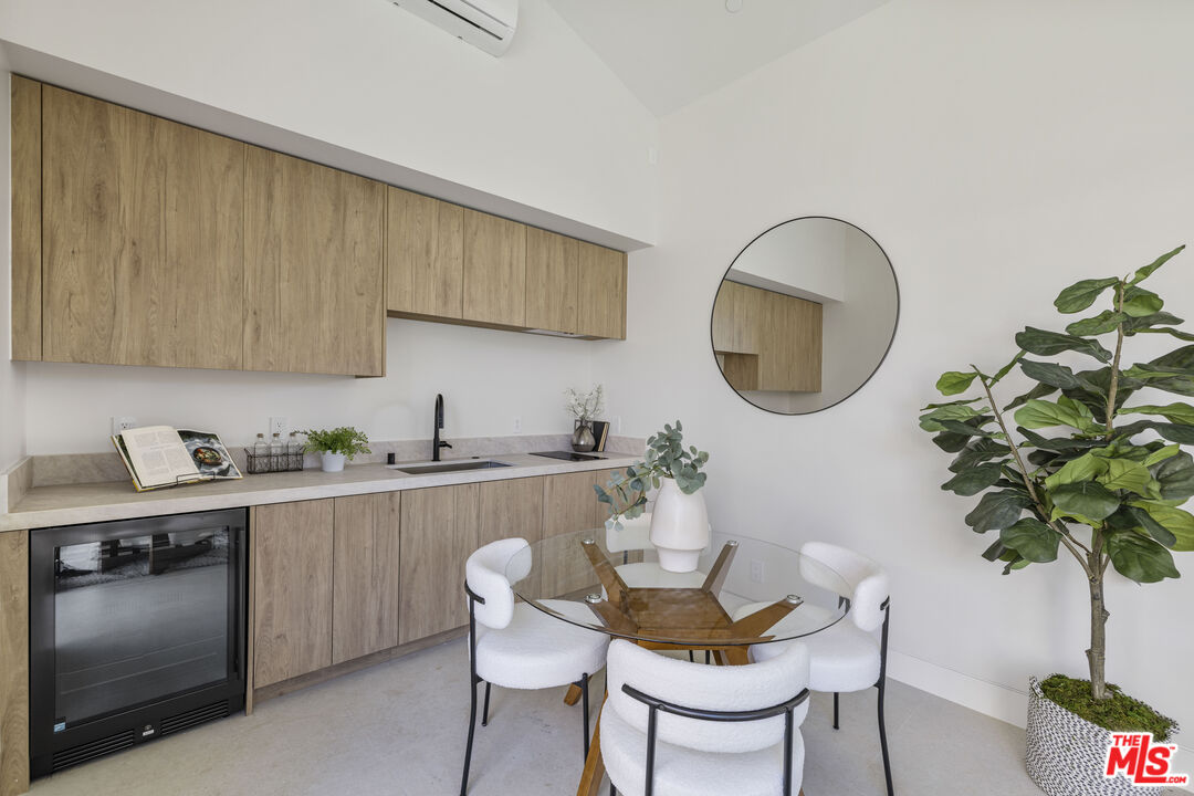 4220 Kenyon Avenue Los Angeles, CA 90066 - Photo 37 of 43 a kitchen with a sink cabinets and window