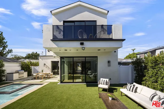 a front view of a house with a garage