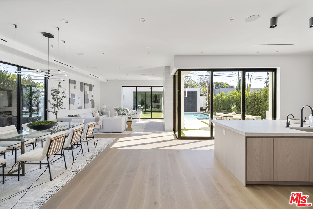 4220 Kenyon Avenue Los Angeles, CA 90066 - Photo 8 of 43 a living room with furniture and large windows