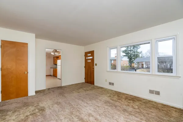 an empty room with windows