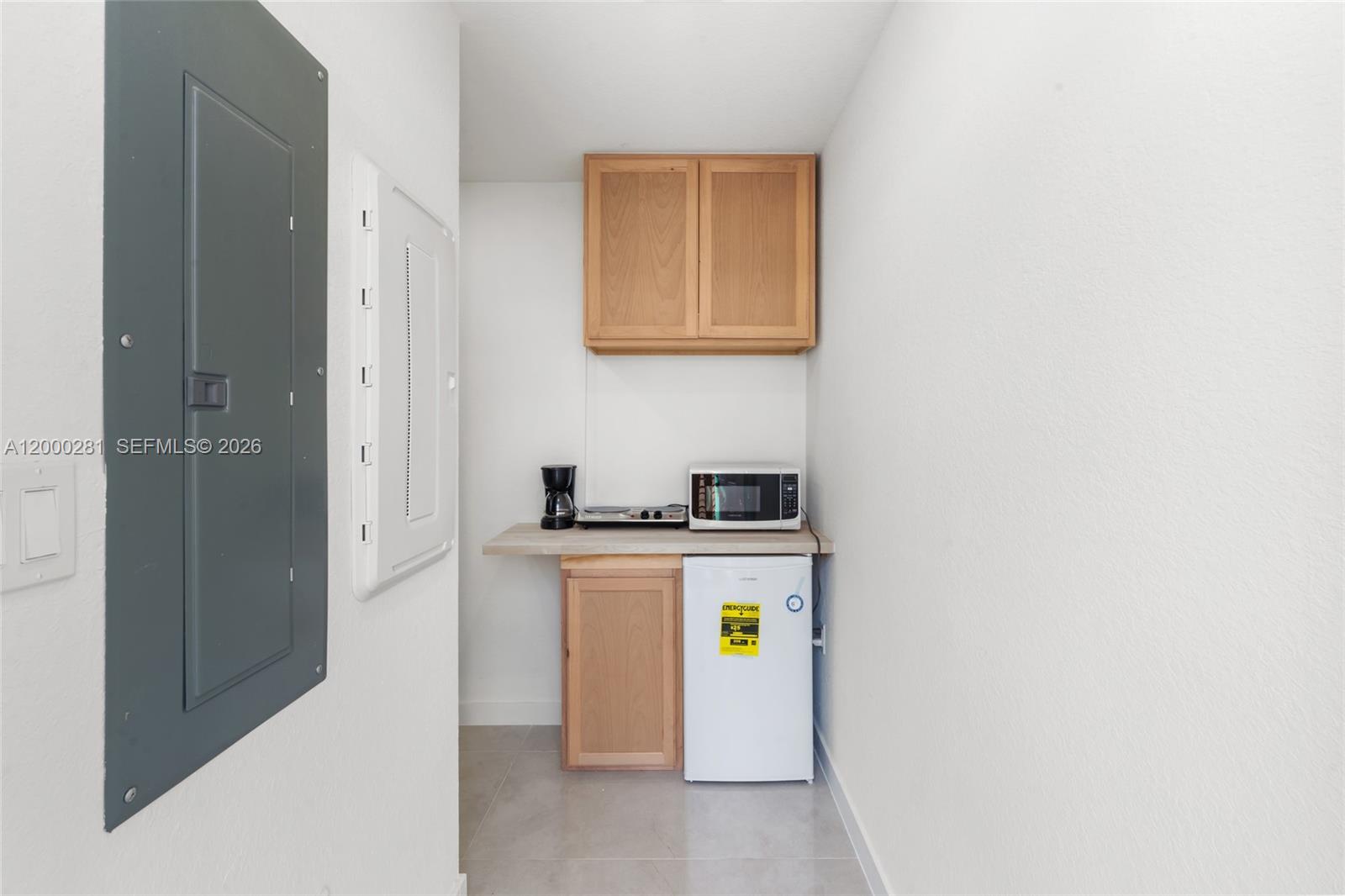 14513 Southwest 261st Street, Unit EFFICIENCY Homestead, FL 33032 - Photo 3 of 9 a utility room with washer and dryer
