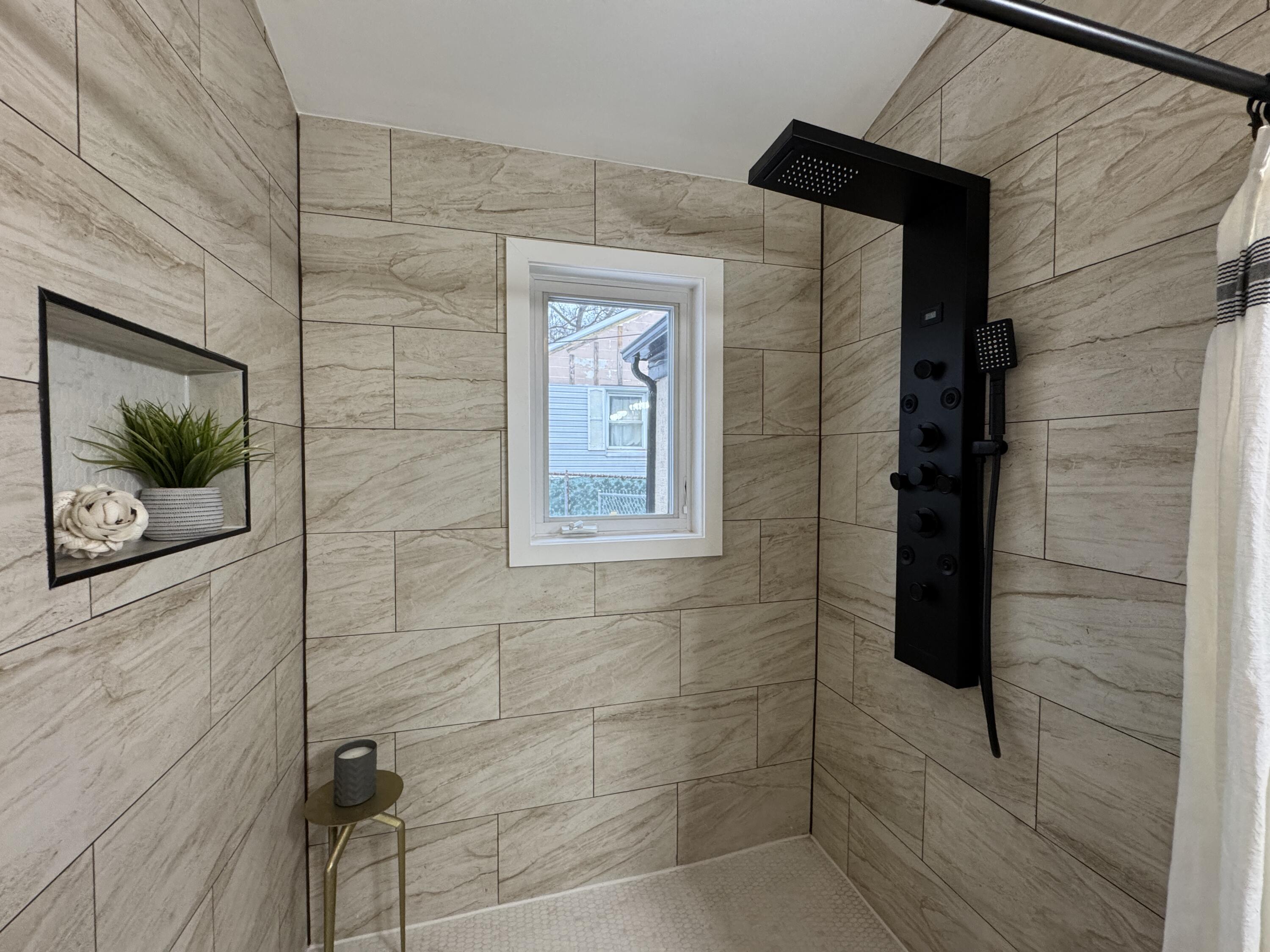 656 Montgomery Street Gary, IN 46403 - Photo 14 of 31 a bathroom with a shower