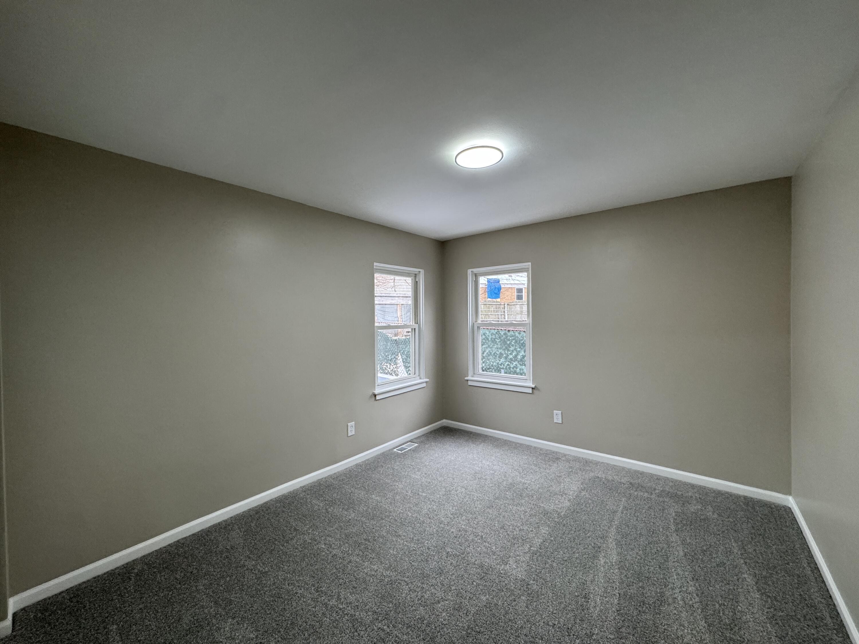 656 Montgomery Street Gary, IN 46403 - Photo 15 of 31 an empty room with windows